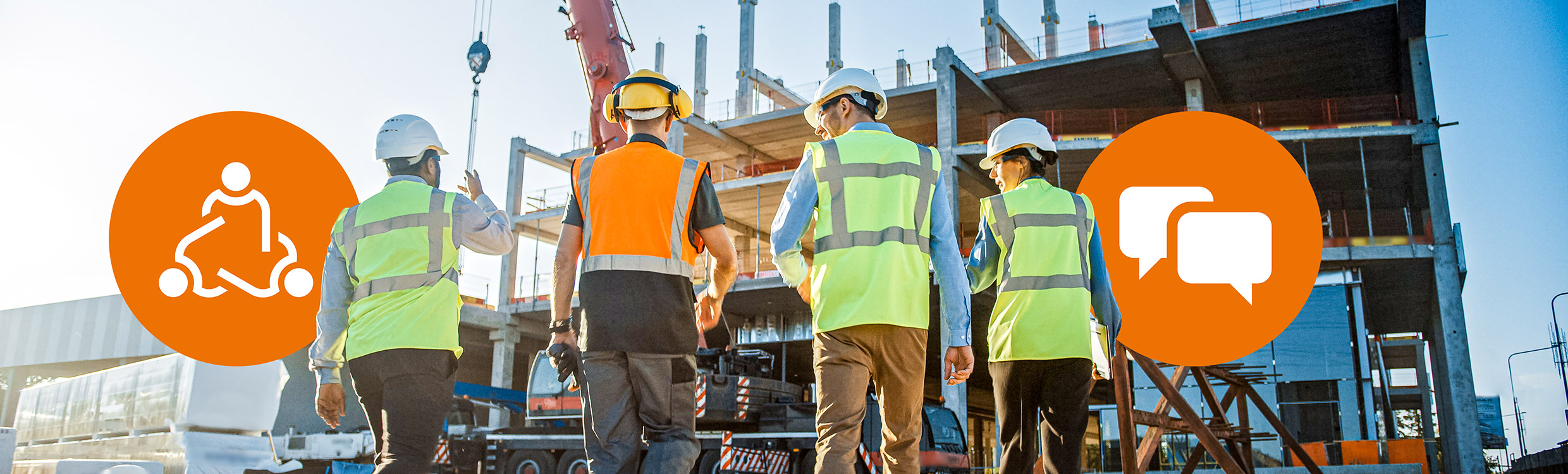 Group of workers on construction site talking